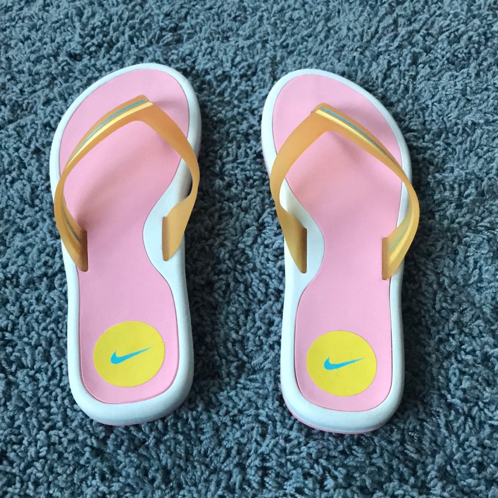 NWOT - Pink Nike Flip Flops